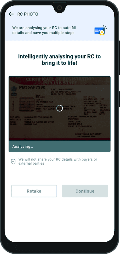 RC photo screen analysing a registration certificate to autofill car details.